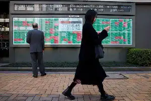 Asian Markets Under Pressure From Tech Stock Sell-Off and Middle East Geopolitical Turmoil