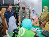 Governor of North Sumatra Urges Expansion of BPJS Kesehatan Insurance for Ride-Hailing Partners in Medan