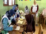 Synergy Between Unigoro KKN and Turi Polindes for Health Screening of SDN Turi 1 Students